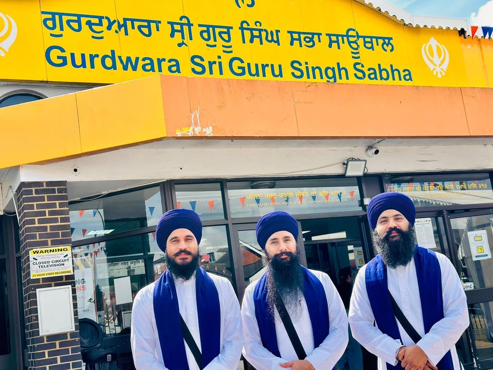 Members of the Jatha at a Gurdwara Sahib